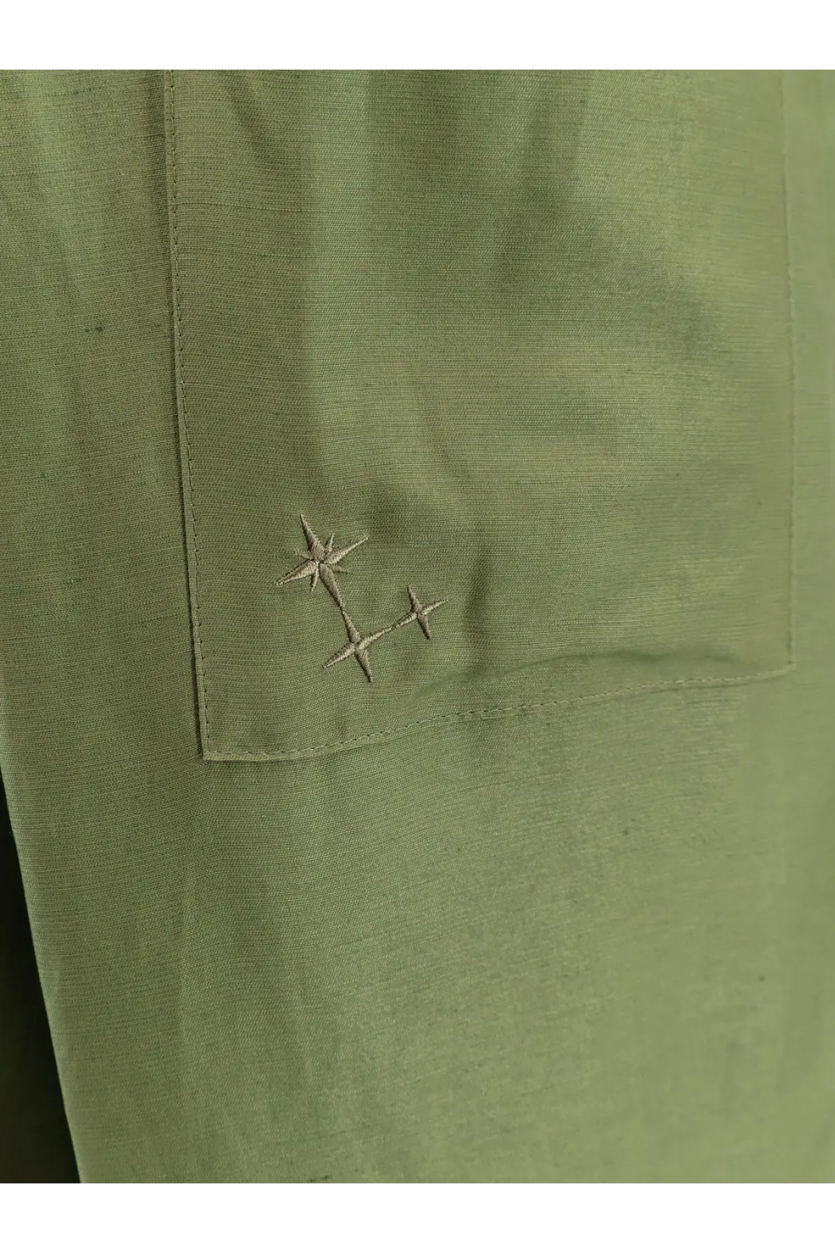 Laneus men’s olive green viscose and linen trousers pocket with delicate beige star embroidery detail