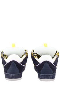 Lanvin men’s sneaker curb blue navy blue suede with white rubber soles and yellow zigzag patterned laces