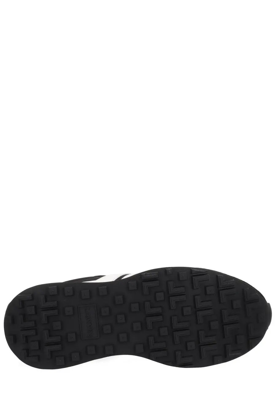 Black rubber sole with textured blocky tread and white stripe on the side of lanvin unisex sneaker bumpr black