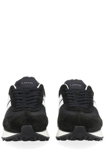 Black and white lanvin unisex sneaker bumpr with suede accents and chunky rubber sole for casual wear