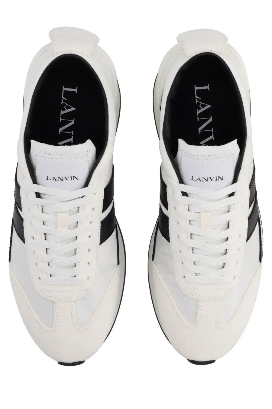 White lanvin unisex sneaker bumpr with black stripes and branding on tongue and inner lining in leather material