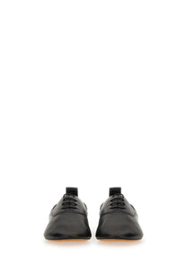 Lanvin women’s black leather oxford lace up slipper with sleek minimalist design and subtle stitching details