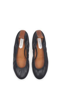 Lanvin women’s leather ballerina flats in black with tan inner lining and matching strap detail
