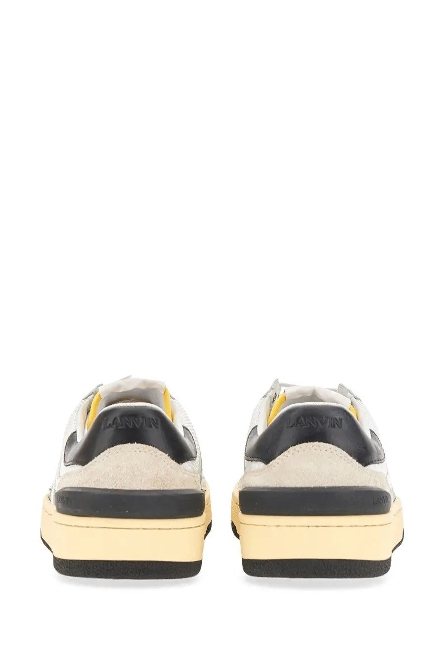Beige and black lanvin women’s suede and nappa leather sneakers with yellow heel tab accents shown from the back side