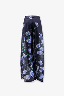 Lavi women’s frangipane ramie trousers in dark navy sheer fabric with light purple floral pattern and green stems