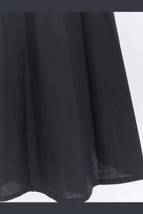 Black sheer fabric skirt with flowing pleated design from lavi women’s mambo cotton dress black collection