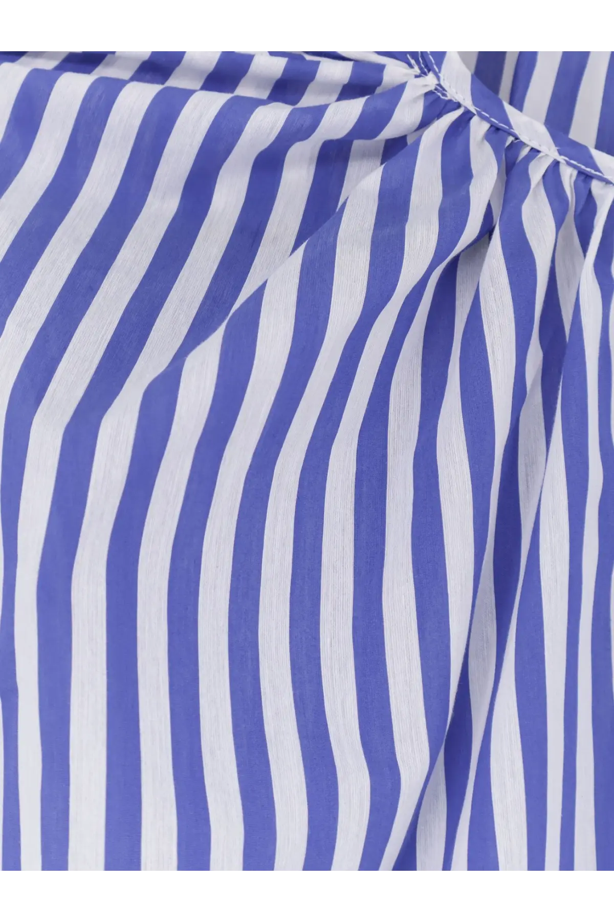 A lavi women’s nenné cotton blend shirt in blue with bold royal blue and white vertical stripes on lightweight fabric