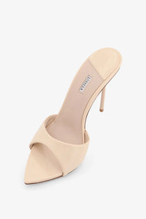 Le silla women’s bella patent leather beige satin slip-on mule heel with slender stiletto sole visible from the back