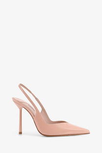 A sleek nude patent leather slingback pump with a slender stiletto heel from Le Silla Chanel Vivienne collection
