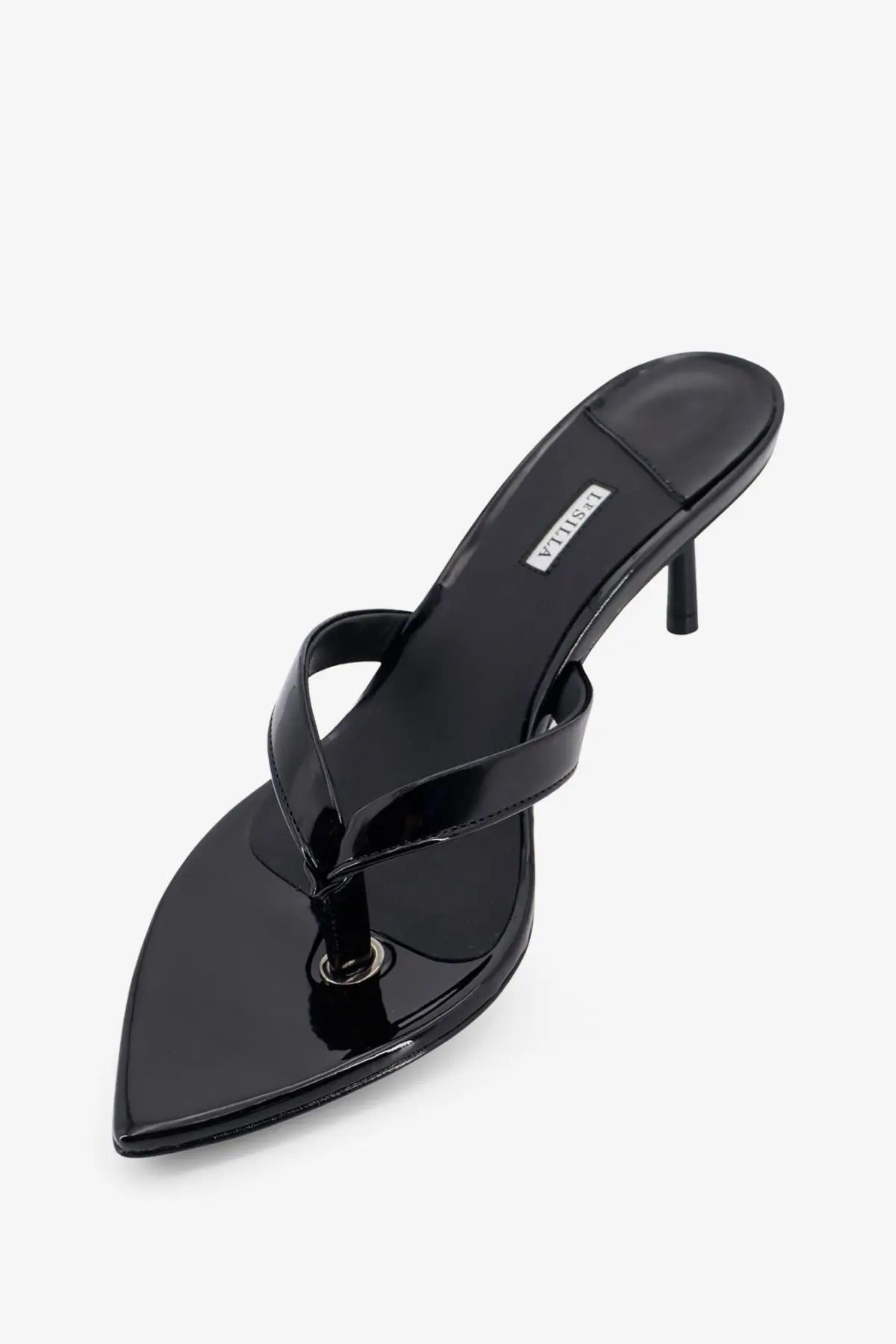 Le silla womens gisele black patent leather thong sandal with slender heel and pointed toe shown from the back