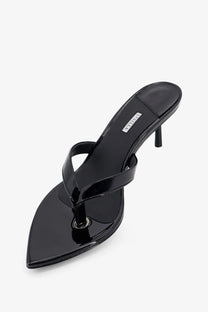 Le silla womens gisele black patent leather thong sandal with slender heel and pointed toe shown from the back