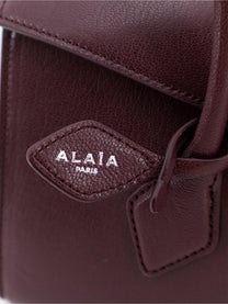 ALAÏA Women's Le Teckel Flap Leather Handbag Red
