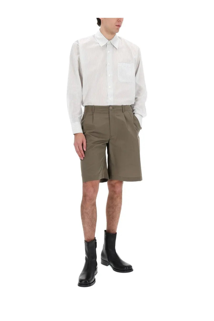 Khaki pleated shorts with button closure and side pockets shown with our legacy men’s above shirt white