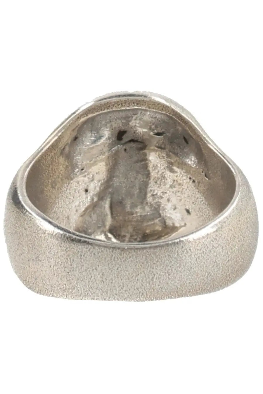 Our Legacy men’s Anello Cranium silver ring with textured matte finish and embossed skull interior design