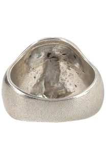 Our Legacy men’s Anello Cranium silver ring with textured matte finish and embossed skull interior design