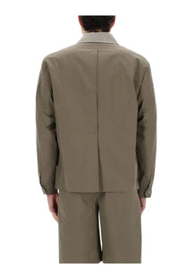 Our Legacy men’s blazer jacket pack beige back view showing minimalist olive green utility jacket with tonal collar contrast