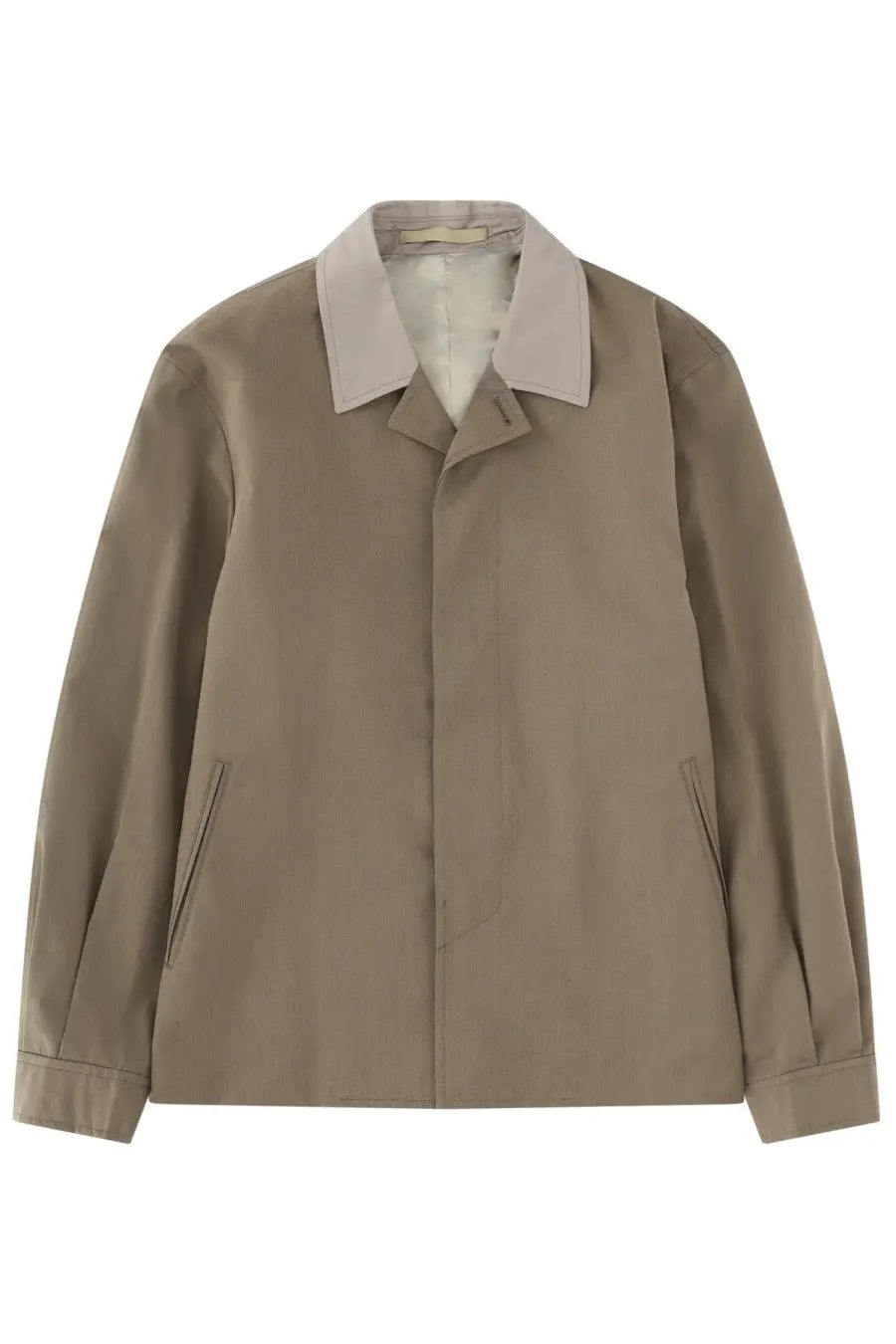 Our Legacy men’s beige trench coat with light gray collar and subtle vertical stitching details