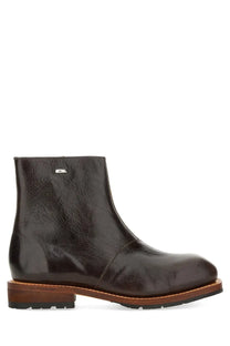 Our Legacy men’s boot engine brown dark brown leather ankle boot with sturdy rubber sole and visible stitching details