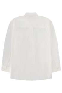 Our Legacy men’s borrowed shirt is a crisp white long-sleeved blouse with a classic collar and front patch pockets
