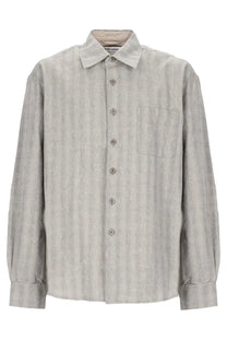 Our Legacy men’s grey button-down shirt in cotton linen blend with subtle textured pattern and matching buttons