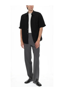 Our Legacy men’s camicia black short-sleeved button-up shirt in cupro with relaxed fit and subtle texture