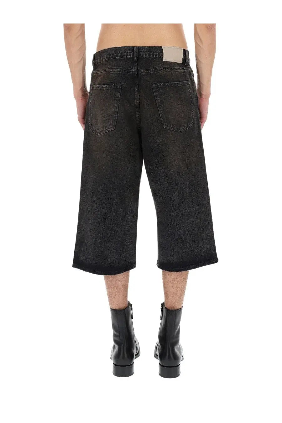 Our Legacy men’s green capri cut shorts made of black faded distressed denim with a straight-leg cut