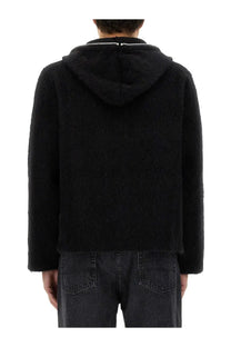 Our legacy men’s black cardigan con zip with a fuzzy hood and plush textured material with front zipper
