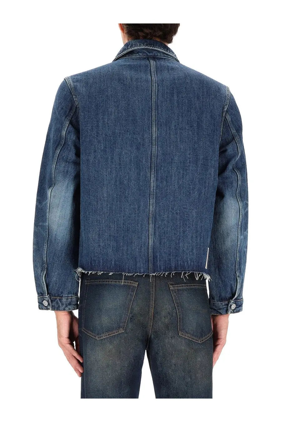 Our Legacy men’s cut rebirth jacket blue is a dark blue denim jacket with frayed hem and cuffs with classic stitching
