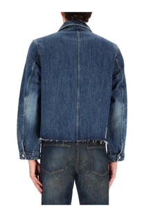 Our Legacy men’s cut rebirth jacket blue is a dark blue denim jacket with frayed hem and cuffs with classic stitching