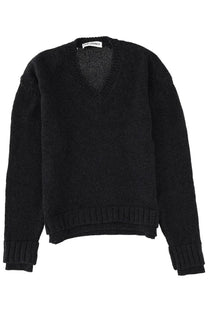 Our Legacy men’s black knit v-neck sweater with ribbed cuffs and hem featuring a textured weave