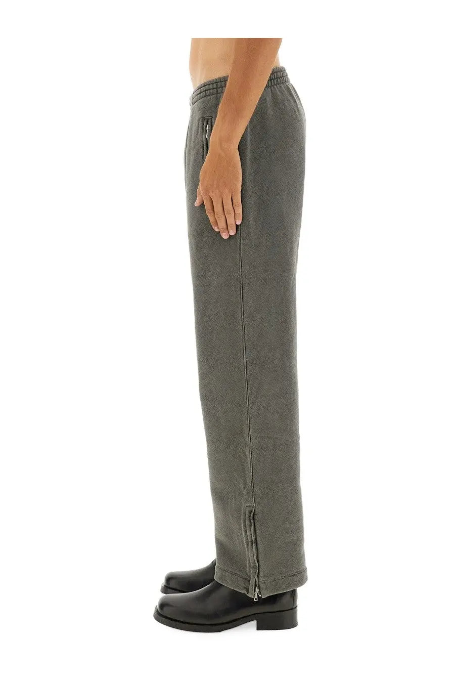 Our Legacy men’s fleece dark gray sweatpants with relaxed fit side zippers and elastic waistband