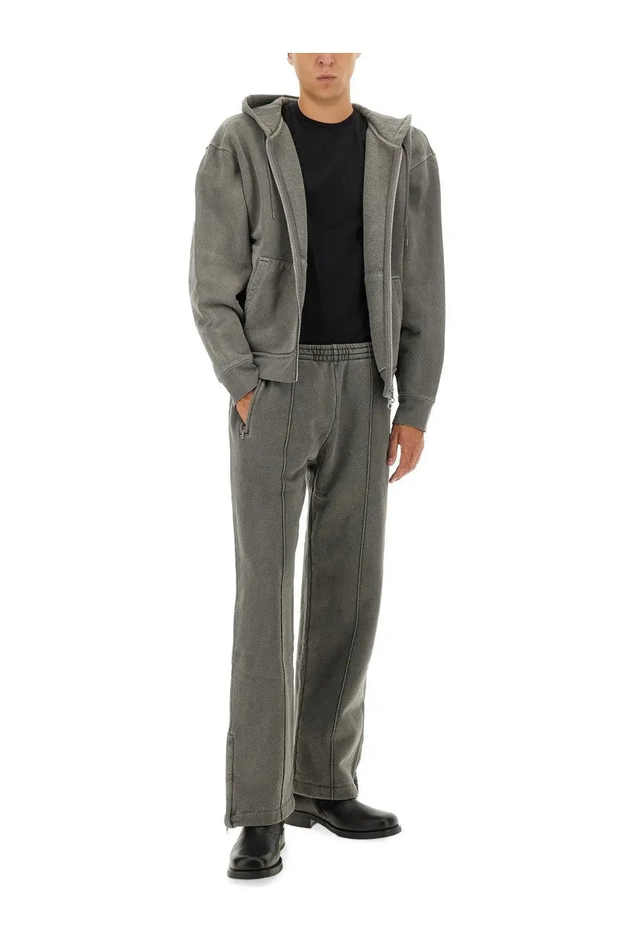 Gray hooded zip-up jacket with matching tapered fleece pants and black shoes in Our Legacy mens fleece pants grey set