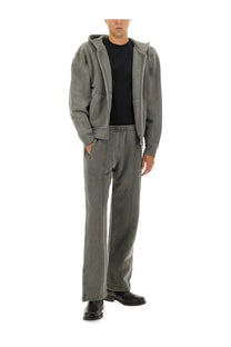 Gray hooded zip-up jacket with matching tapered fleece pants and black shoes in Our Legacy mens fleece pants grey set