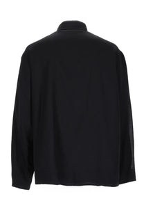 Our legacy men’s giacca evolved black long-sleeved shirt with subtle mesh panel on the right sleeve