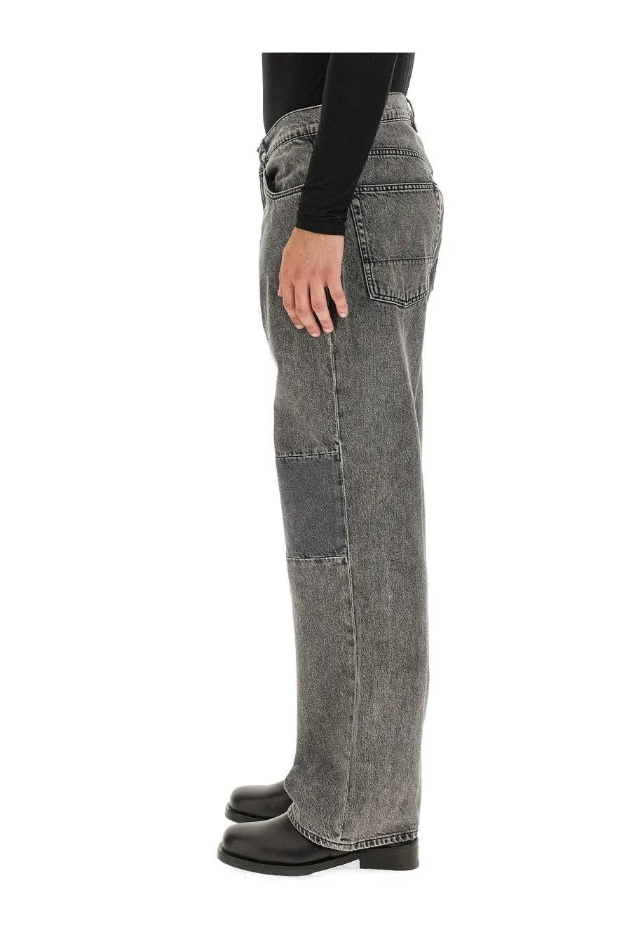 Our Legacy men’s grey denim jeans with faded wash and patchwork detailing on the thighs in extended third cut fit