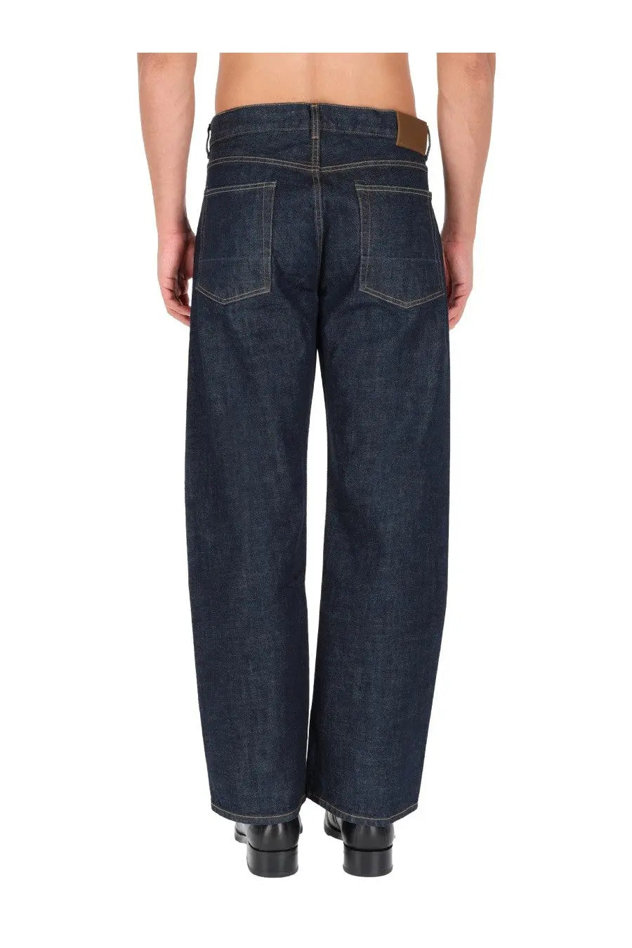 Our Legacy men’s jeans third cut blue dark indigo denim wide-leg jeans with brown leather patch at the waistband