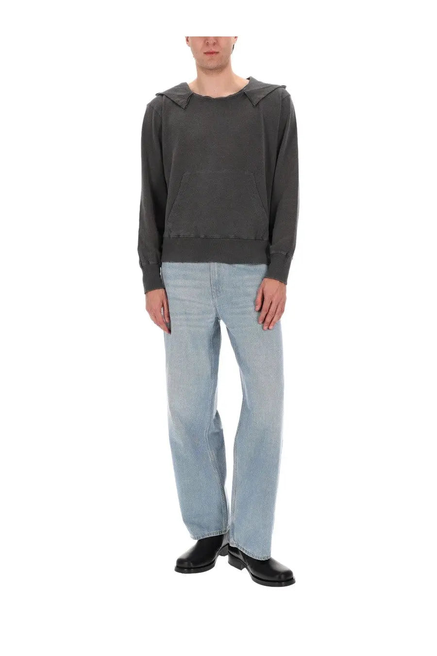 Dark gray hooded sweatshirt with a slightly distressed look and ribbed cuffs paired with our legacy men’s vast cut blue jeans