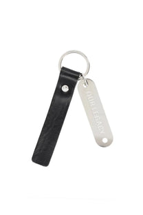 Black leather keychain with silver metal tag engraved with our legacy and small silver rivet for men