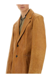 Our Legacy men’s leather opening blazer in tan suede with black buttons and a notched lapel