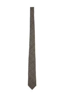 A slim dark gray linen tie with a subtle herringbone weave from our legacy mens collection