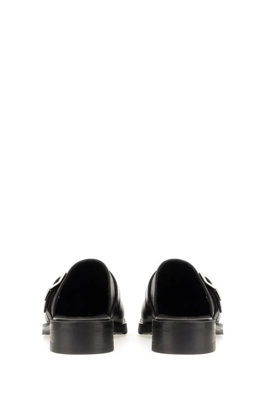 Our Legacy men’s black leather mule truck with sleek minimalist design and chunky soles shown from the back