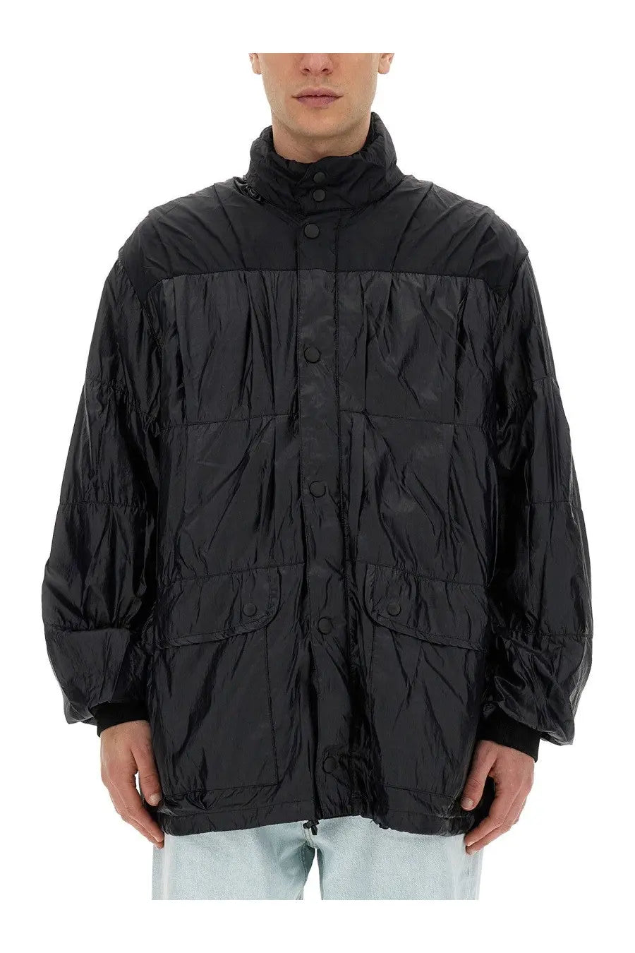 Black quilted nylon puffer jacket with high collar and button closures from our legacy mens collection