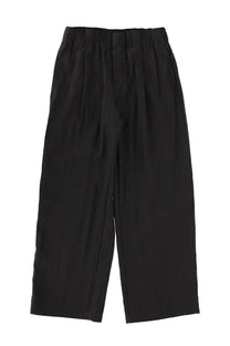 Our Legacy men’s pantaloni leisure black wide-leg trousers with elastic waistband and relaxed flowing silhouette
