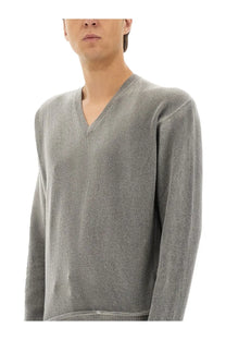 Our Legacy men’s parallel mesh grey soft heathered v-neck sweater with fine knit texture and ribbed hem