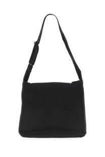 Our Legacy men’s sling bag black nylon with a single adjustable shoulder strap for comfortable carrying