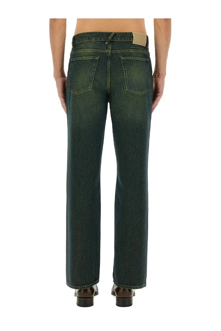 Our legacy men’s straight leg jeans in dark green denim shown from the back with classic pockets and straight cut