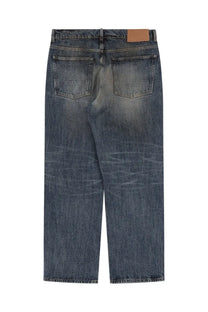 Our legacy men’s third cut jeans blue dark-wash denim with faded distressed look and brown leather waistband patch