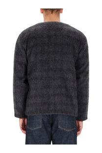 Our Legacy men’s wool blend cardigan in grey with a dark gray fuzzy knit and subtle textured pattern
