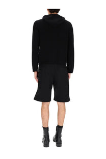 Our Legacy men’s wool sweatshirt in black hooded knit with long sleeves and a relaxed fit