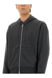 Our Legacy men’s zipper Rascal sweatshirt grey in dark gray heathered fabric with drawstring hood and ribbed cuffs